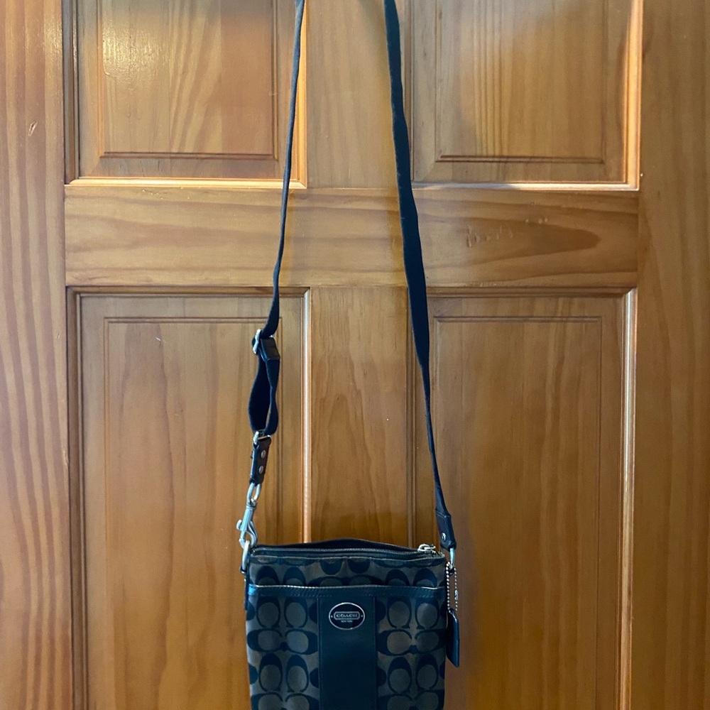 Coach Black Crossbody Bag with Adjustable Strap and Silver Hardware